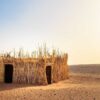 Man lost in Desert Story hut in desert