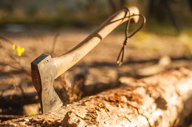 Smart Work to sharpen the axe which is used to cut the trees